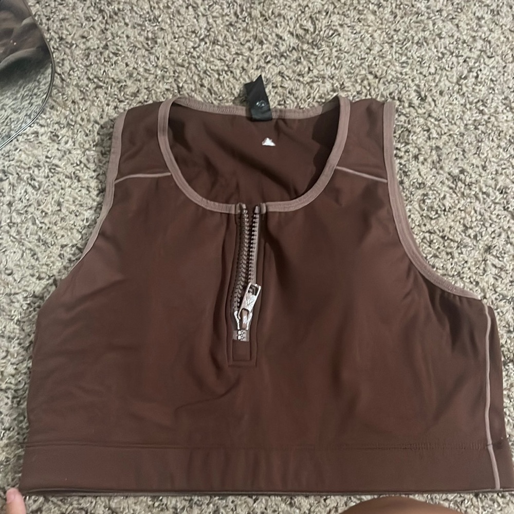 Brown Balance Athletica/vitality sports bra that zips up . Wore once.